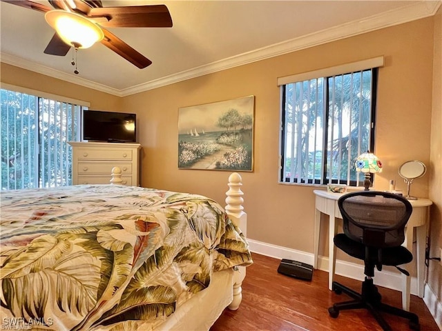 bedroom featuring ornamental molding, ceiling fan, baseboards, and wood finished floors