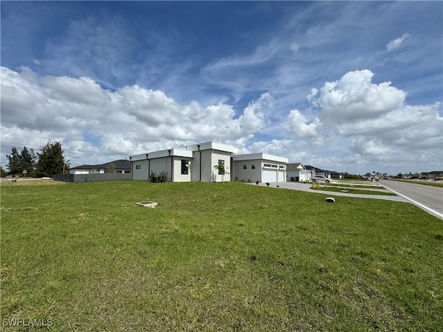 view of yard featuring a garage