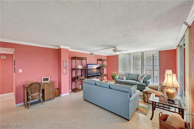 living area featuring light tile patterned floors, baseboards, ornamental molding, and a textured ceiling