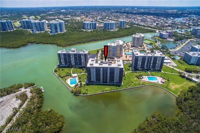 drone / aerial view with a water view and a city view