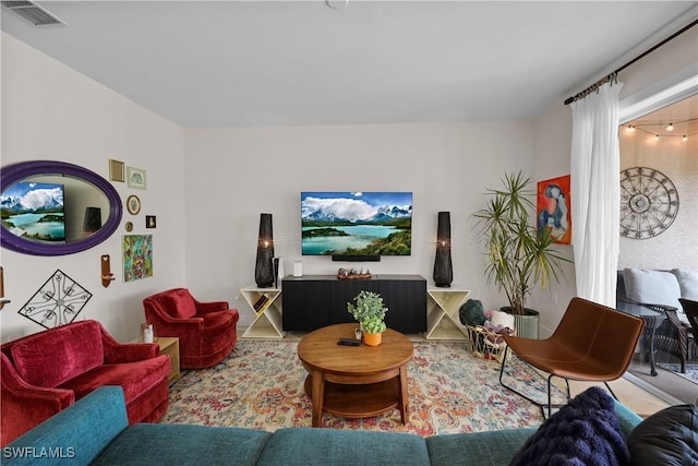 living room with visible vents