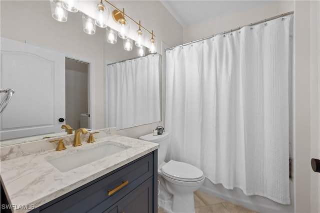 bathroom featuring toilet, tile patterned floors, shower / tub combo with curtain, and vanity