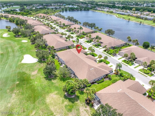 aerial view featuring a water view and a residential view