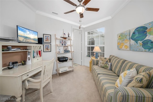 home office featuring visible vents, light carpet, ornamental molding, and a ceiling fan