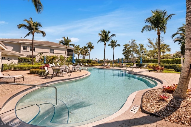 community pool featuring a patio