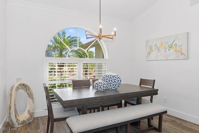 5311 Harborage Dr, Fort Myers, FL 33908 - dining area featuring crown molding, wood finished floors, and baseboards