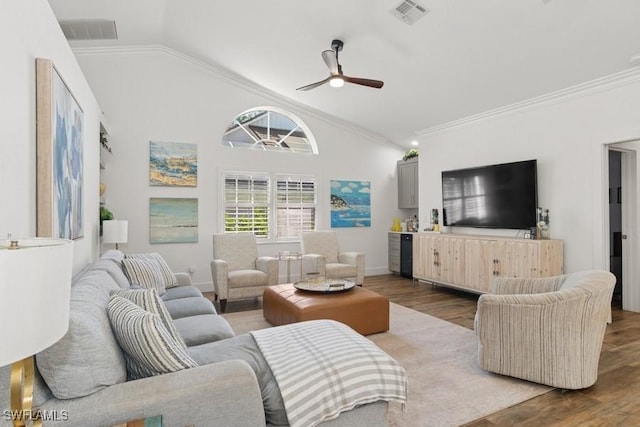 5311 Harborage Dr, Fort Myers, FL 33908 - living area featuring lofted ceiling, wood finished floors, a ceiling fan, ornamental molding, and baseboards