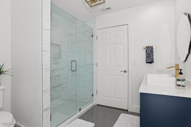 5311 Harborage Dr, Fort Myers, FL 33908 - bathroom featuring toilet, a marble finish shower, and double vanity
