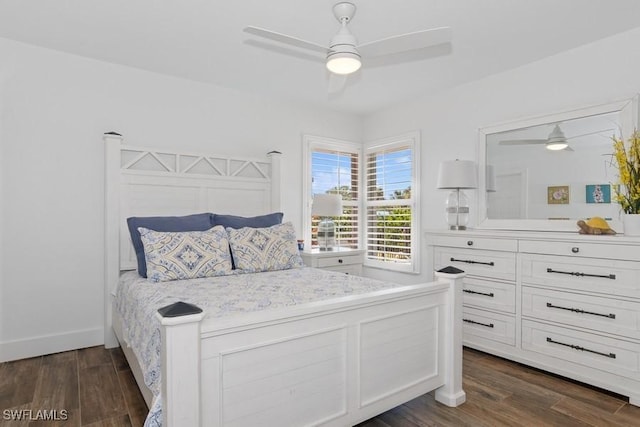 5311 Harborage Dr, Fort Myers, FL 33908 - bedroom with dark wood finished floors, ceiling fan, and baseboards