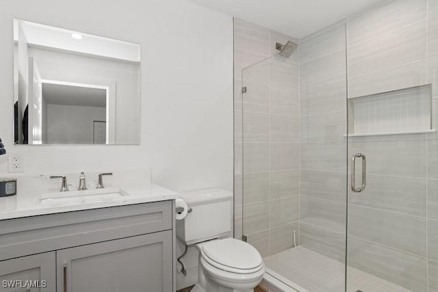 5311 Harborage Dr, Fort Myers, FL 33908 - bathroom with vanity, a stall shower, and toilet