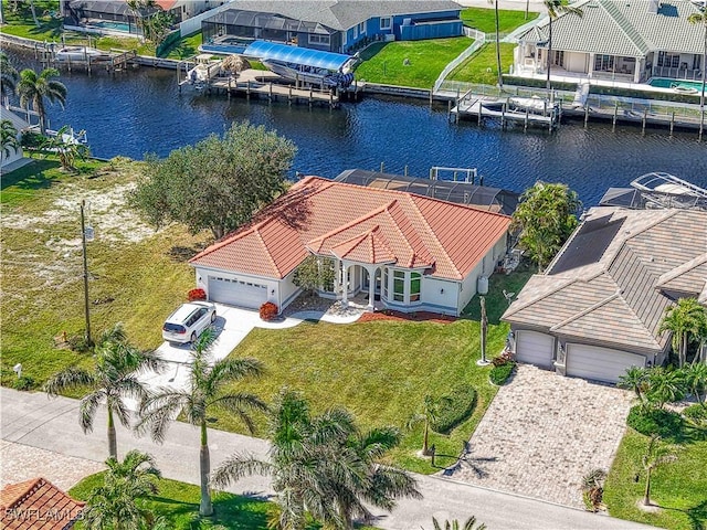 aerial view with a water view and a residential view