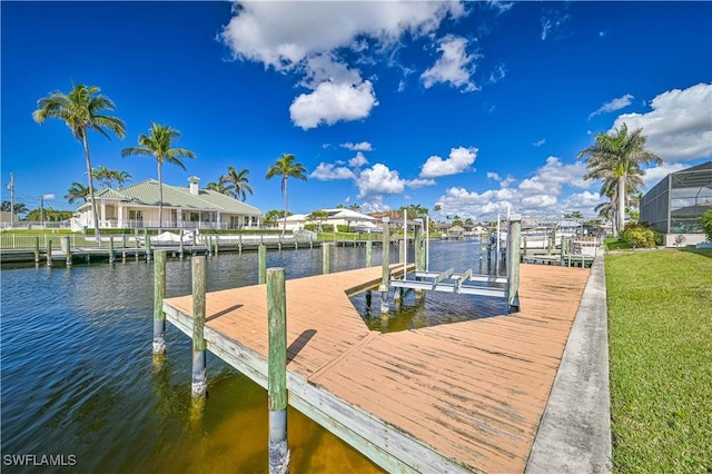 view of dock featuring a water view and boat lift