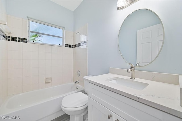 full bath with toilet, shower / tub combination, and vanity