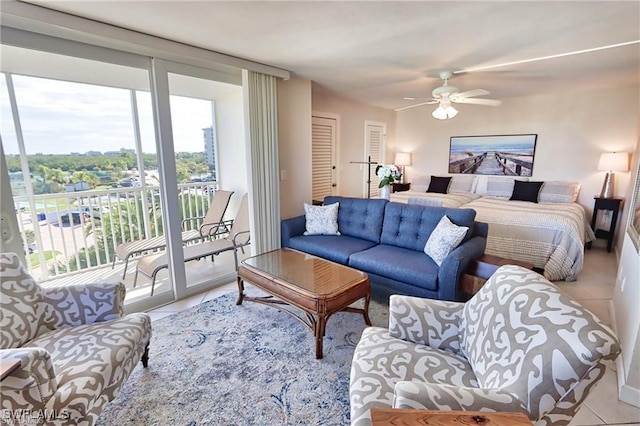 bedroom with ceiling fan, access to outside, and tile patterned floors