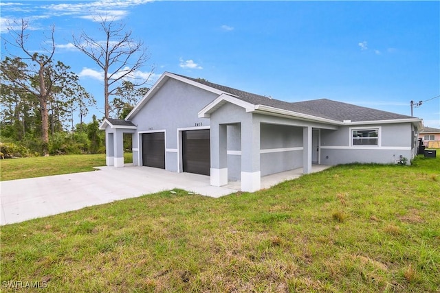 view of side of home featuring an attached garage, a yard, concrete driveway, roof with shingles, and stucco siding