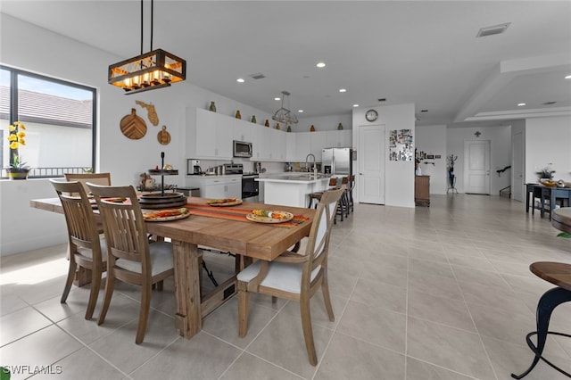 dining area with recessed lighting, visible vents, and light tile patterned flooring