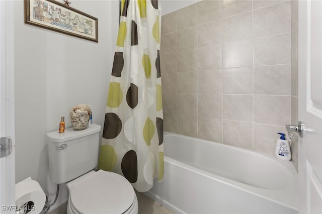 full bathroom with shower / tub combo and toilet