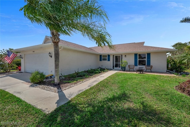 ranch-style house with an attached garage, driveway, a front yard, and stucco siding