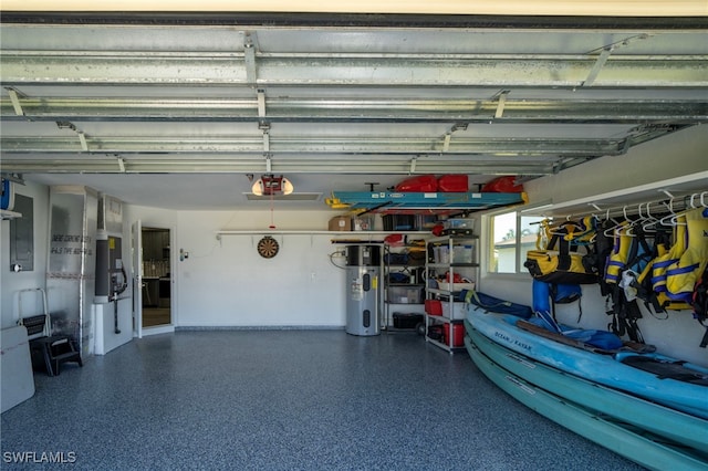 garage featuring a garage door opener and hybrid water heater