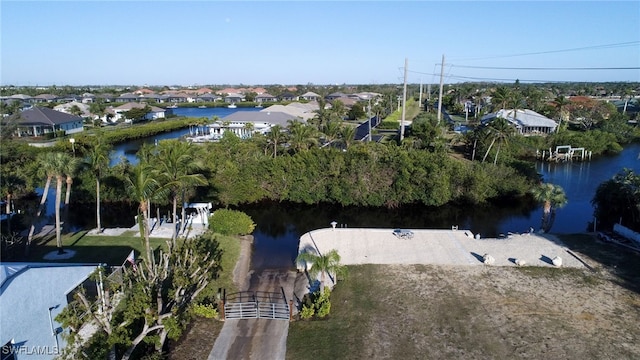 aerial view with a residential view and a water view