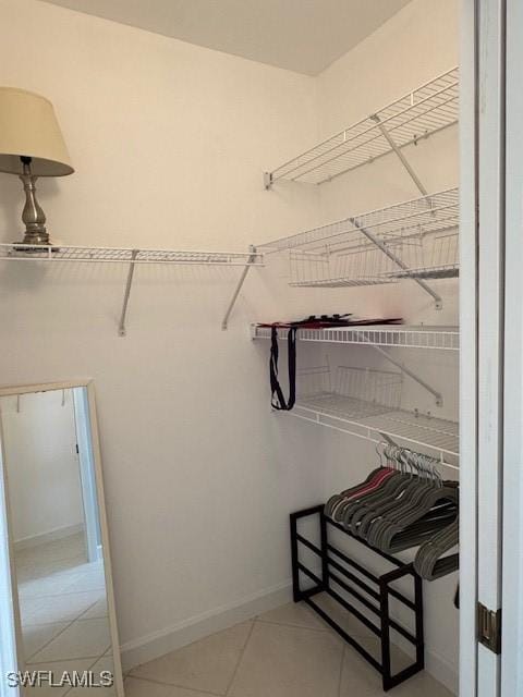 walk in closet featuring tile patterned floors