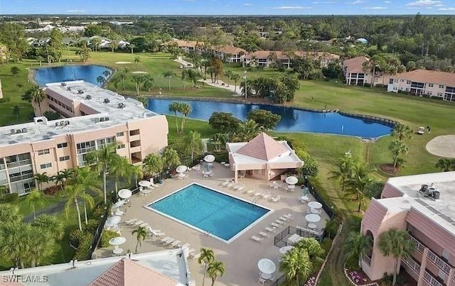 aerial view featuring a water view and view of golf course