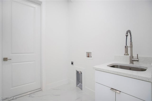 laundry room featuring washer hookup, marble finish floor, hookup for an electric dryer, a sink, and baseboards