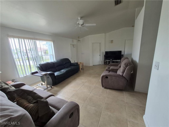 living room featuring light tile patterned floors, ceiling fan, and visible vents