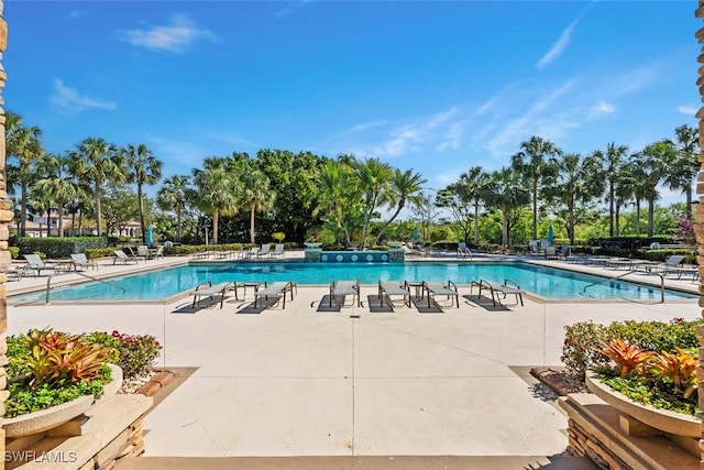 pool featuring a patio area