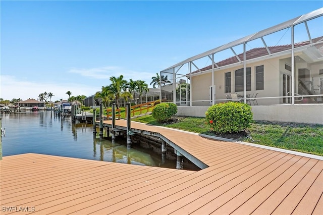 dock area featuring a lanai and a water view