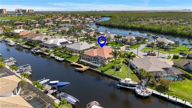 aerial view with a residential view and a water view