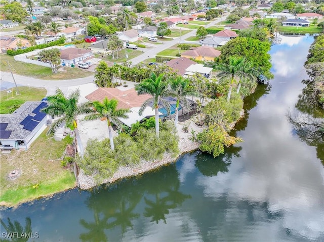 aerial view with a water view and a residential view