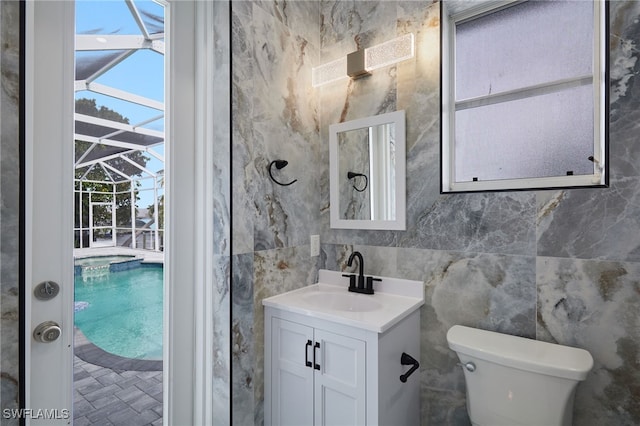 bathroom with toilet and vanity