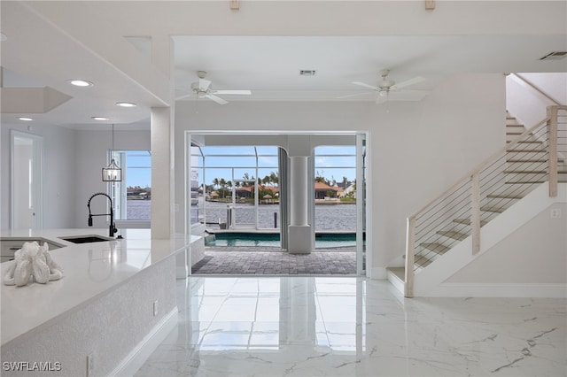 interior space with visible vents, a healthy amount of sunlight, and marble finish floor