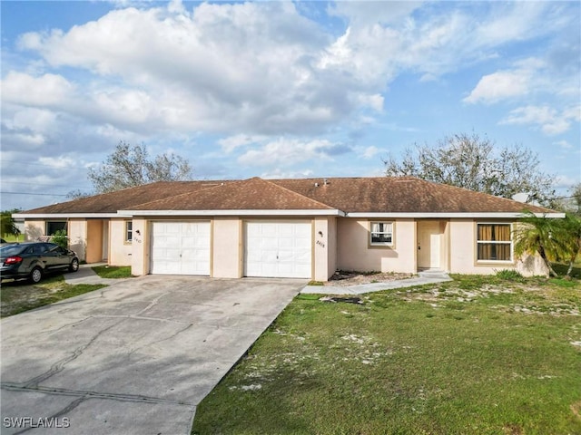 single story home featuring a garage, concrete driveway, a front yard, and stucco siding