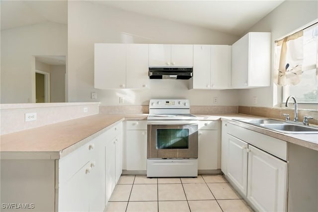 kitchen with vaulted ceiling, white electric stove, under cabinet range hood, and a sink