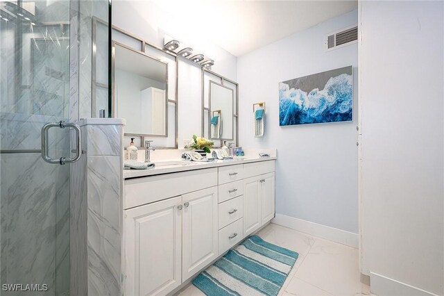 full bath with marble finish floor, visible vents, baseboards, and a marble finish shower