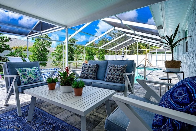 view of patio / terrace with a fenced in pool, glass enclosure, a fenced backyard, and an outdoor living space