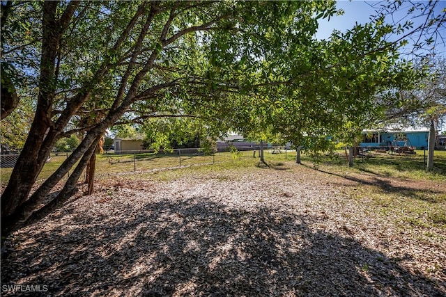 view of yard featuring fence