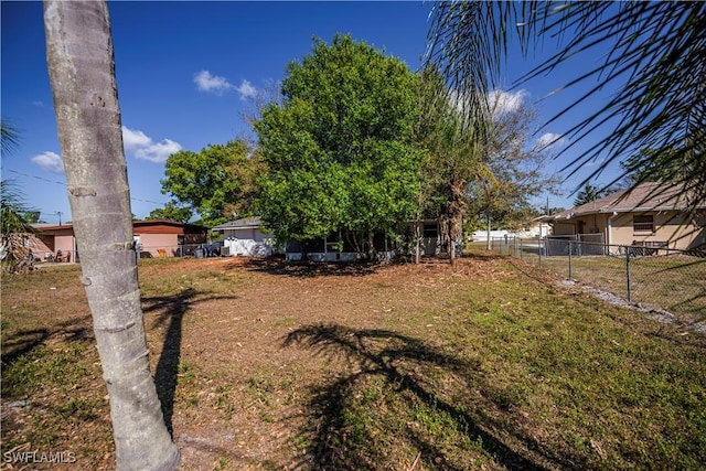 view of yard with fence