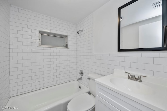 full bathroom with toilet, tub / shower combination, tile walls, and vanity