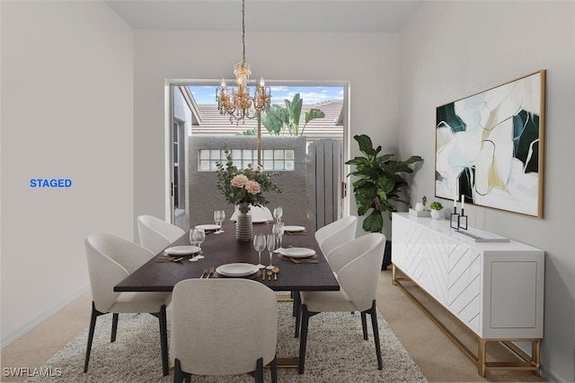 10391 Quail Crown Dr Unit 34, Naples, FL 34119 - dining room featuring a chandelier, light colored carpet, and baseboards