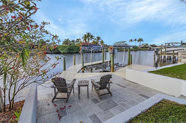 dock area featuring a water view and boat lift