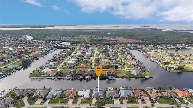 aerial view with a water view and a residential view