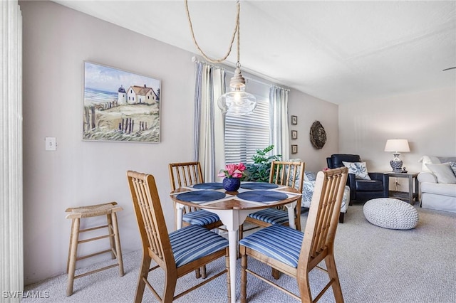 dining area with carpet