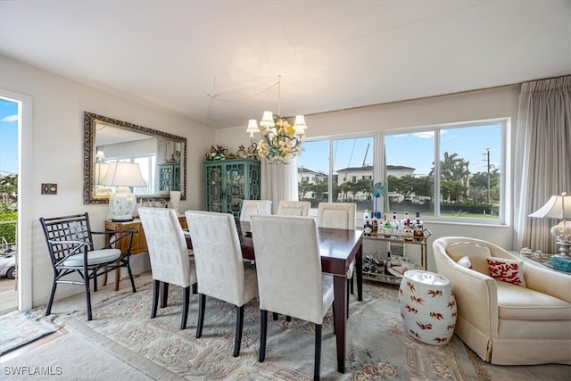 dining room with a chandelier