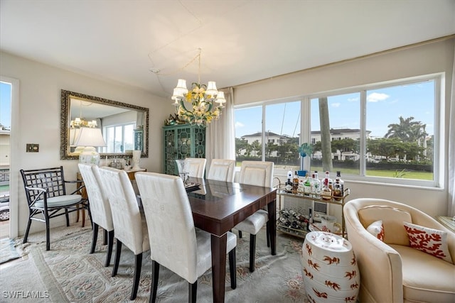 dining area with a chandelier