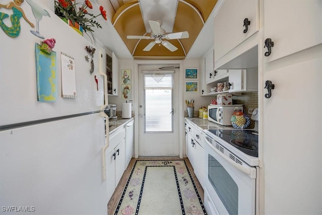 kitchen with white appliances, a ceiling fan, white cabinets, light countertops, and open shelves