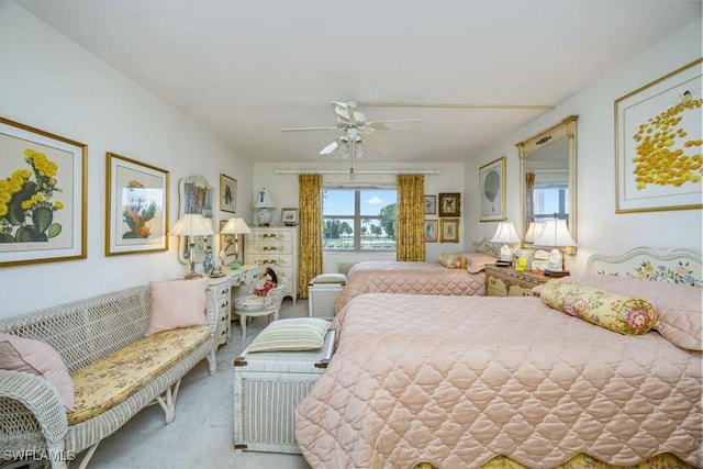 bedroom with carpet and a ceiling fan