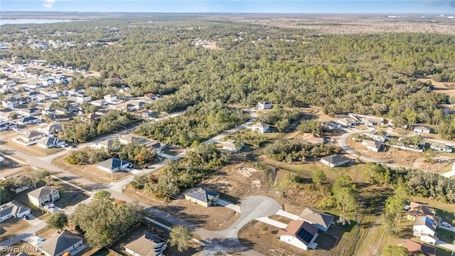 bird's eye view with a residential view and a forest view